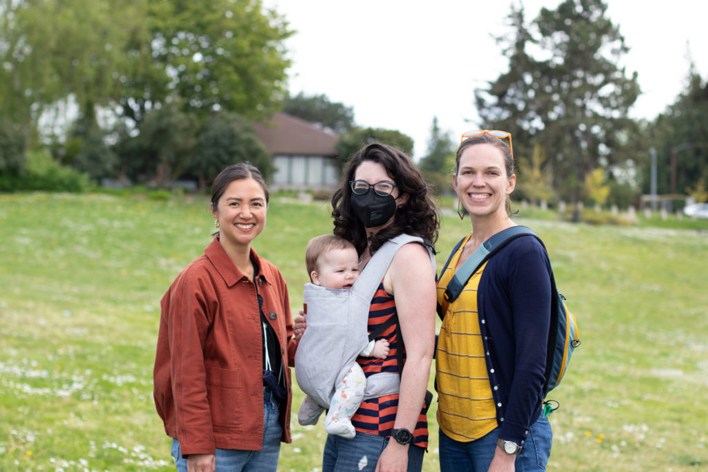 Family standing on lawn